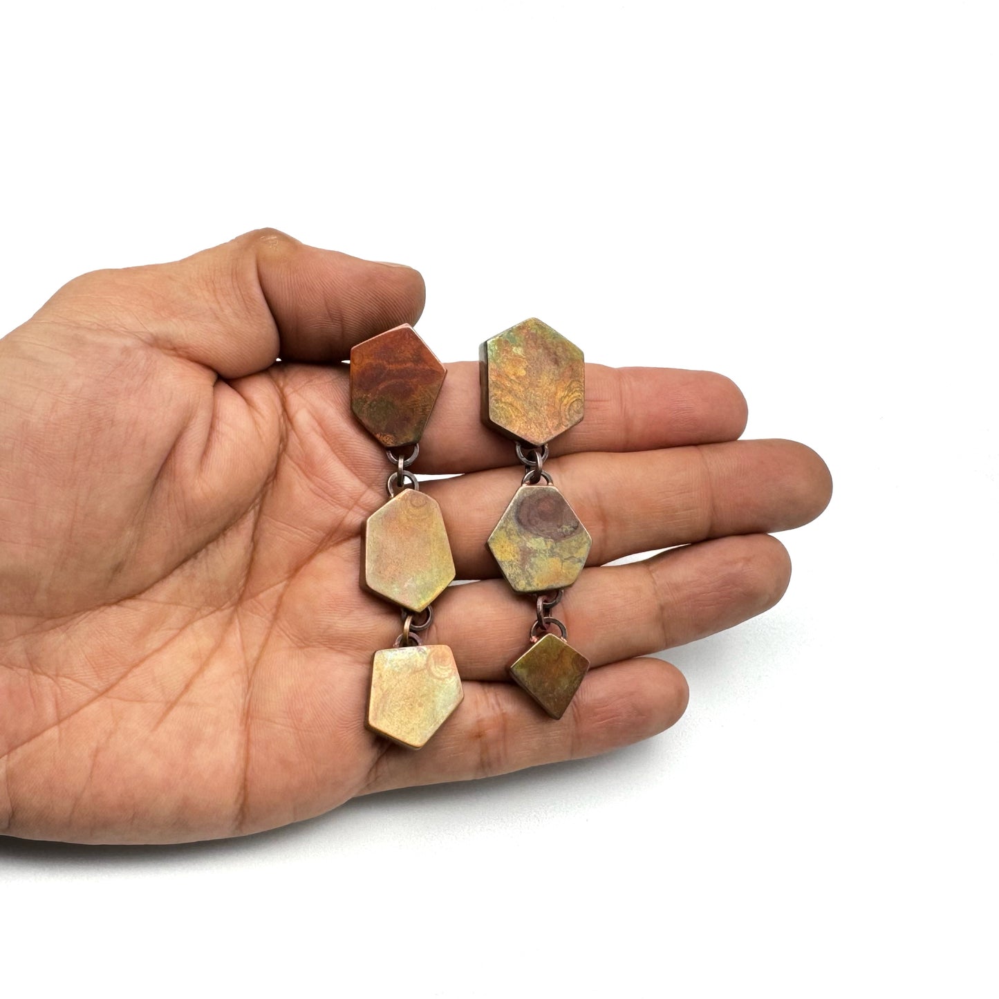 Hollow construction copper earrings