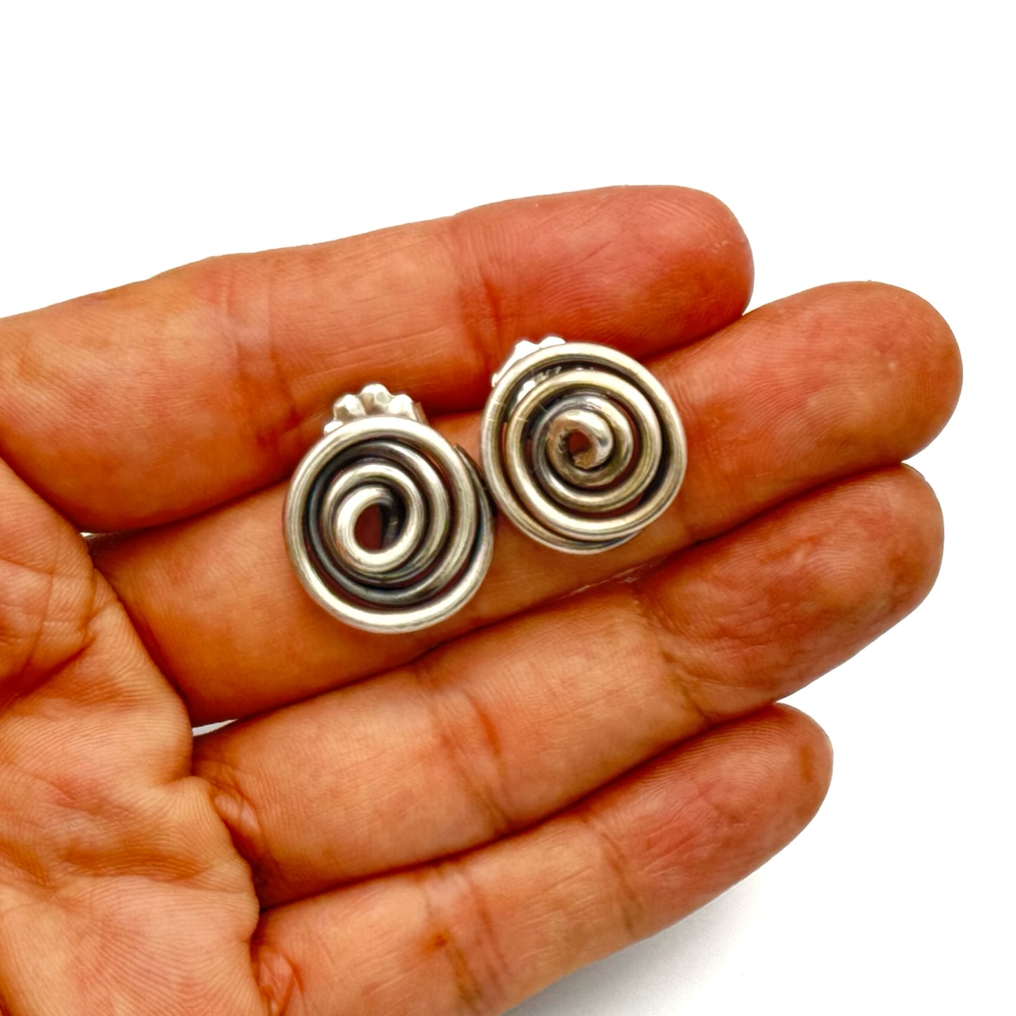 Silver wire earrings.