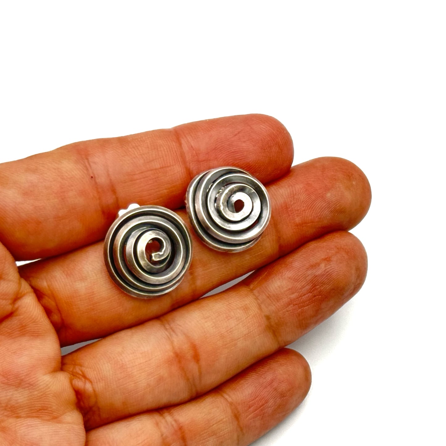 Square silver wire earrings.