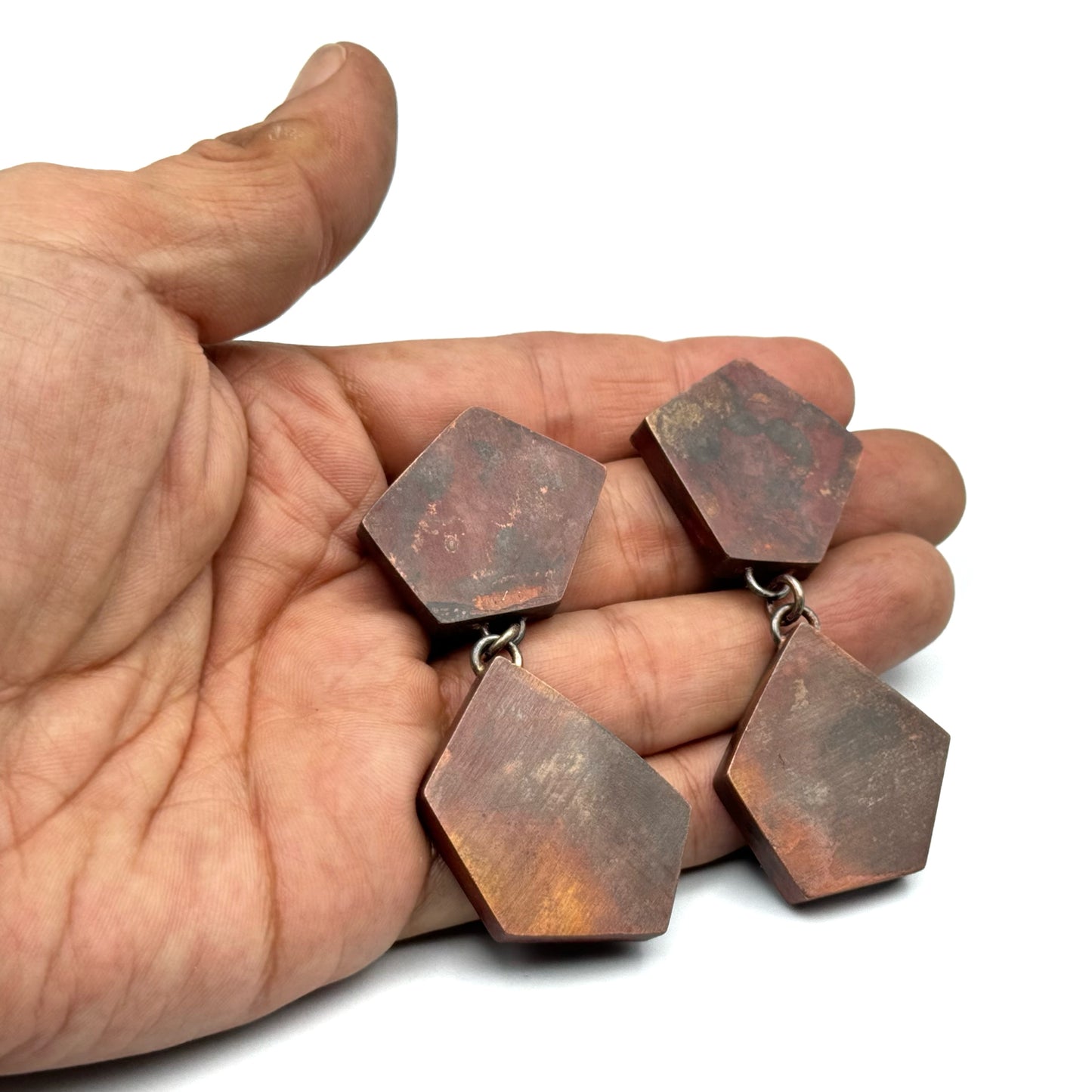 Hollow construction copper earrings