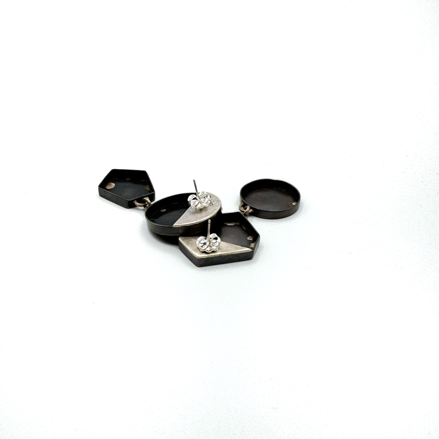 Hollow construction copper earrings